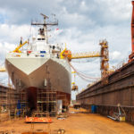 Big ship - rear view with propeller under repair.